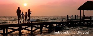 family on a pier at the ocean